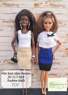 two dolls standing next to each other wearing skirts and tops with bows on their head