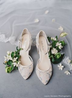 wedding shoes and flowers on the floor