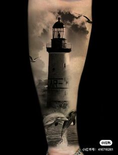 an arm with a lighthouse and seagulls on it