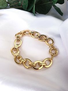 ★ ★ ★FREE SHIPPING ★ ★ ★ PRODUCT DESCRIPTION This beautiful and bold gold statement bracelet is a necessary accessory in your daily combination, it's simply chic and resistant with spring ring closure which creates the perfect look! MEASUREMENT AND SIZE (in the picture) The total length of each bracelet is 6 inches (16.3cm). choose length from the drop-down menu. MATERIAL This bracelet is made from Micron (Thick) 18K Gold plating over brass - tarnish resistance, nickel-free, safe to use in water Everyday Gold Chunky Bracelets, Gold Chunky Chain Link Charm Bracelet, Yellow Gold Chunky Chain Bracelet, Elegant Chunky Oval Link Bracelets, Elegant Chunky Oval Link Bracelet, Gold Oval Link Charm Bracelet With Chunky Chain, Gold Charm Bracelet With Chunky Oval Link Chain, Elegant Chunky Yellow Gold Bracelet, Gold Bracelet With Chunky Oval Links