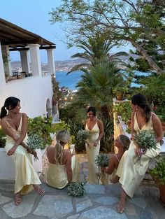 the bridesmaids are getting ready to walk down the aisle