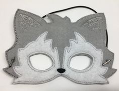 "Wolf Masks. Great for dramatic play/dress-up. Fun mask for Halloween or Cos Play. These masks would make a fun party favor or fun addition to a themed birthday party. Need a larger quantity than what I have listed? Message me. I can usually accommodate larger orders. These masks are made from felt. The details are machine embroidered. The masks include a 13\" elastic strap. This size typically fits from age 3 to small adult. This mask measures approximately 7 by 5 inches. These items can be cle Themed Masks For Halloween Costume Party, Themed Halloween Masks For Costume Party, Halloween Themed Costume Party Masks, Themed Party Eye Mask, Novelty Masks For Carnival Costume Party, Novelty Halloween Costume Party Masks, Themed Halloween Party Supplies, Themed Party Eye Mask Costume Accessory, Fun Party Masks For Carnival