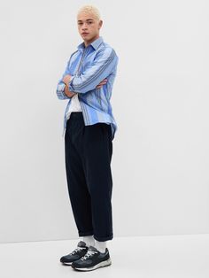 Button-down collar.  Long sleeves with button cuffs.  Button front.  Standard fit.  Slim through the chest and shoulders.  Models are 6'1"/185 cm–6'2"/188 cm with a 31"/79 cm waist and 32"/81 cm–33"/84 cm inseam, and are wearing Gap Gap Clothing, Gap Outfits, Support People, Japan Fashion, Poplin Shirt, Button Down Collar, Design Reference, Pose Reference, Recycled Materials