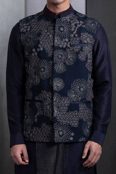 Midnight navy blue sleeveless bundi crafted in cotton fabric with all over brazen fleur embroidery detail. - Aza Fashions Blue Cotton Nehru Jacket For Wedding, Fitted Blue Nehru Jacket With Floral Embroidery, Indian Groom Wear, Nehru Jackets, Groom Wear, Stylish Mens Outfits, Designer Clothes For Men, Designer Suits, Stylish Men