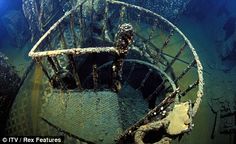 an underwater spiral staircase in the ocean