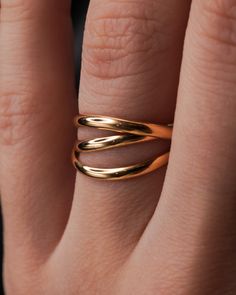 This is a gorgeous, unique ring set made up of three individual, entwined rings. These are a favorite for both men and women. Customize the finish, metal type and more to create your own perfect ring! This listing is for one single Interlocking ring set made up of 3 INDIVIDUAL RINGS which are permanently entwined. Each band measures approx. 2mm in width and is made from a D-Shaped, half round metal. This Interlocking ring set includes three 14K GOLD FILL rings. These Interlocking rings can me ma Modern Gold Toe Ring, Gold Stackable Rings With Polished Finish And Modern Twist, Gold Timeless Bypass Ring For Promise, Gold Double Band Rings With Modern Twist, Modern Twist Double Band Gold Rings, Modern Twist 14k Gold Midi Rings, Timeless 14k Gold Bypass Ring, Rolling Ring, Interlocking Rings