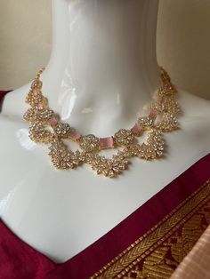 AD pink Doublet Designer Neckless Set/Gold finish/Small Neckless Gift Jewelry/South indian jewelry/Asian Jewelry/Pakisthani Jewelry This item is perfect for parties and festivals! DETAILS: Includes One Necklace and Two Earrings. Necklace: 18.0 inches. Adjustable length. Chain Closure. Weighs 1.55oz ( 45 g).  Earring:1.8 inch(es) long. Set weighs 0.60 oz (18g). Earring backs push on/off. Material: Imitation gold,  Ruby AD Stones GJ Finish. Finish: Premium gold with Dimond finish.  NOTE: I try my Elegant Pink Temple Necklace For Wedding, Elegant Pink Temple Necklace For Celebration, Traditional Pink Temple Necklace For Festive Occasions, Elegant Pink Temple Necklace For Festive Occasions, Pink Temple Necklace For Wedding And Festive Occasions, Pink Temple Necklace For Festive Wedding, Bridal Necklace For Diwali Reception, Pink Jeweled Necklaces For Wedding, Pink Jeweled Wedding Necklaces