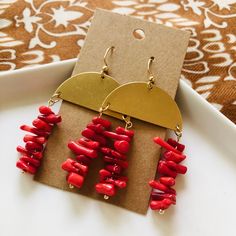 Sustainable Red Bamboo Coral and Brass Half-Circle Earrings These beautiful, beachy earrings are made from sustainable red bamboo coral and brass half-circle focals. They are the perfect accessory for your favorite boho or summer looks and make a great gift! I've been fascinated with coral since I was a kid and love the look of it, but just didn't feel comfortable with the ethical consequences of using it in my designs. That's what was behind my decision to use sustainable, manmade coral in this Handmade Red Hoop Earrings For Beach, Red Bohemian Hoop Earrings For Beach, Bohemian Red Hoop Earrings For Beach, Nickel-free Red Earrings For The Beach, Coral Earrings With Ear Wire As Gift, Coral Dangle Earrings, Red Round Beach Earrings, Red Round Earrings For Beach, Circle Earrings With Ear Wire For Beach