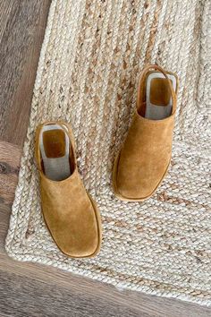 Super comfortable suede all season wardrobe go-to w/ a great 2" platform. Made in a family run factory in Portugal. We are honored to work with this skillful, artful producer to make beautiful shoes for our customers. Suede construction Padded footbed 2" suede wrapped platform Made in Portugal Please size up if between sizes Fall Suede Slip-on Clogs, Chic Suede Platform Mules, Winter Suede Slip-on Clogs, Brown Suede-lined Clogs For Fall, Fall Shoes 2024, Slip-on Suede Clogs With Textured Sole, Platform Clogs, Cashmere Accessories, Denim Shoes