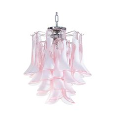 a pink and white chandelier hanging from a ceiling