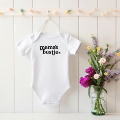 As a parent, you know that every moment with your little one is precious. That's why our 'mama's bestie' bodysuit isn't just clothing--it's a reminder of the incredible journey you're on together, creating memories that will last a lifetime. Buy this as a sweet Mother's Day gift or why not snag one for yourself. :) 💙 Don't miss out! Hit that "favorite" button for True Blue Baby Co to be the trendsetter in snagging the latest designs and snagging sweet deals!  ⋒ QUICK SIZING TIP ⋒ Our onesies® a White Onesie For Mother's Day Gift, Mother's Day Gift Onesie With Name Print, Mother's Day Gift Onesie With Letter Print, Mother's Day White Onesie With Name Print, Mother's Day Gift White Onesie, The Incredible Journey, White Onesie, Baby Co, Creating Memories