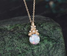 - Metal: Solid gold(14K/18K white/yellow/rose gold),925 sterling silver, platinum available- Main Stone: 6.5mm round lab opal- Accent Stone: diamonds or moissanites- Chain: 16+2 inches. The chain can be adjustable to 18 Inches.- Can be personalized: Yes Gold Opal Jewelry With Round Cut, Diamond White Round Opal Jewelry, Gold Opal Jewelry With Prong Setting, Opal Jewelry With Diamond Accents For Anniversary, Elegant Opal Round Pendant Jewelry, Elegant Round Opal Pendant Jewelry, Anniversary Opal Jewelry With Diamond Accents, Elegant Yellow Gold Opal Jewelry, Elegant Opal Jewelry With Round Stone