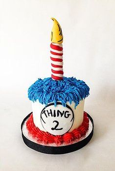 there is a cake that looks like dr seusster's hat with the number two on it