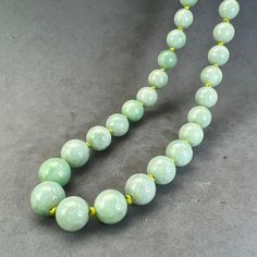 "Style: Estate Burmese jade round bead necklace, natural color fei cui, with a matching silver clasp. 51 beads Material: Natural Jadeite, jadeite, vintage, Burmese jade, green, silver clasp Method: fine polished Type: Necklace, bead necklace Size: bead size 10mm, length 23\"	is_active	18274967	Apparel & Accessories > Jewelry > Necklaces	https://www.etsy.com/listing/1210220591/estate-sale-jade-necklace-plain-round	weddings > jewelry > necklaces	https://i.etsystatic.com/18274967/r/il/ccd1af/378917 Cheap Polished Bead Jade Necklaces, Jade Gemstone Beads Necklaces, Classic Jade Gemstone Beads Jewelry, Traditional Jade Beaded Necklaces, Jade Necklace With Round Gemstone Beads, Beaded Jade Necklaces With Gemstone Beads, Jade Beaded Necklaces With Gemstone Beads, Jade Beaded Necklace With Gemstone Beads, Elegant Round Jade Beaded Necklaces