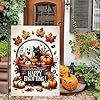 there is a sign that says happy thanksgiving and pumpkins on the front steps outside