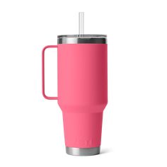 a pink tumbler cup with a straw sticking out of the lid and handle, on a white background