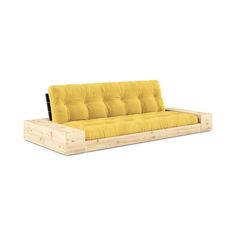 a yellow couch sitting on top of a wooden frame