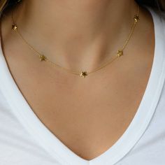 "Super cute and dainty star necklace. It's cute layered or alone. A total of 7 beautifully crafted stars adorn this necklace. -- D E T A I L S -- ▪︎ Made of 925 Sterling Silver ▪︎ Thick plating of 14k Gold or Rhodium ▪︎ Star charm measures 7mm, total of 7 ▪︎ 15\" + 3\" Extension Chain ▪︎ Nickel-free & Hypoallergenic Made with 100% Pure Love! Happy to answer any questions you may have!" Gold Star Necklace, Star Necklace Gold, Necklace Star, Star Charm Necklace, Star Pendant Necklace, Celestial Jewelry, Wedding Jewellery Necklace, Cute Necklace, 925 Sterling Silver Chain