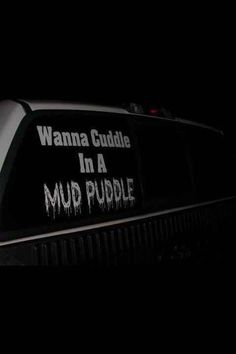 a van with the words wanna cuddle in mud puddle written on it's side