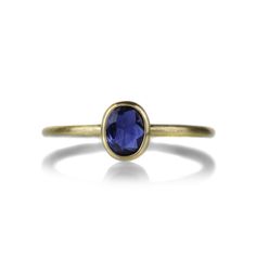 Just the color pop you’ve been craving, this seriously stackable 18k yellow gold ring from Gabriella Kiss features an oval, bezel set blue sapphire. Stone measures 3/16" x 1/4". Size 6.75. Handcrafted in Hudson Valley, NY, U.S. Gabriella Kiss, Blue Sapphire Stone, Hudson Valley Ny, Blue Sapphire Ring, 18k Yellow Gold Ring, Blue Sapphire Rings, Sapphire Stone, Yellow Gold Ring, Hudson Valley