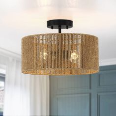 a chandelier hanging from the ceiling in a room