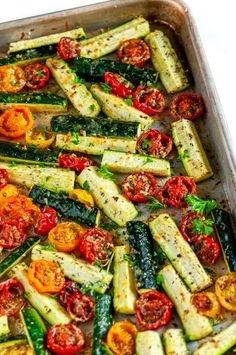 a pan filled with cooked vegetables on top of a table