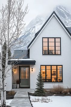 Scandinavian house exterior modern design featuring crisp white walls sage green door and natural stone pathway Modern Scandinavian House Exterior, Modern Scandinavian House, Scandinavian Modern House, Scandinavian House, Nordic House, House Exteriors