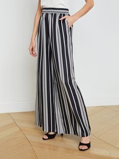 Our timeless ultra-wide Lillian pant, updated in a bold black and white stripe. With an elegant drape and flow, it includes a comfortable stretch waistband and side pockets that make it effortlessly wearable. Dress it down with a fitted tee and sandal. | L'AGENCE Lillian Wide-Leg Pants In Black/White Scarf Stripe Black And White Scarf, White Scarf, Blouse Sale, White Scarves, Elegant Drapes, Ultra Wide, Fitted Tee, Denim Shoes, Wide Leg Pant