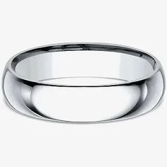 a white gold wedding ring on a white background