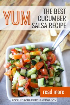 a white bowl filled with cucumber salsa next to tortilla chips