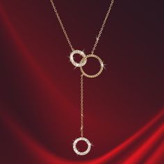 The trio circle is an elegant necklace that will make any outfit feel extra special. Finely crafted from sterling silver, finished in lavish 18K yellow gold. Two interlocking circles are joined with a further suspended circle, accented with sparkling Diamondeau®, flawless simulated diamond. Wear it solo or layer it with other pieces for a bolder look. Halo Necklace, Elegant Necklace, Latest Jewellery, Elegant Necklaces, Signature Design, Time Piece, Circles, Diamond Necklace, Halo