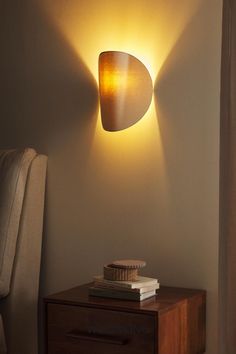 a lamp that is on the side of a wall