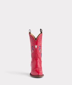 Little Reata is a cherry red boot inspired by the era gone by. Named after the iconic fictional ranch of the 1950’s, Little Reata is a nod to the undeniable confidence of a woman. Because of that perfect blend of high-low color, Little Reata loves to match back to neutrals for a vintage cowgirl look. Embrace the spirit of the West with Little Reata, where vintage charm has never felt so current. 10-inch-tall Cow quarters are saturated with a fun, deep hue, making for a sweet surprise when married with denim, fringe, or any other quintessential pieces of the cowgirl getup. A crème and blue Diamond inlaid band are gently strung from the scallop, winking at the floral inlays throughout the quarter. Signature Lucchese x NF pull straps aid in pulling on your Little Reata’s for a night out. Pict Denim Fringe, Cowgirl Look, Vintage Cowgirl, Red Boots, Lifestyle Shop, Cherry Red, Leather Care, Blue Diamond, The Spirit