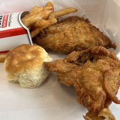 fried chicken and french fries in a take out box