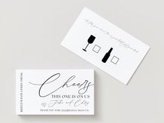 two business cards with wine glasses on them, one is for someone to write their name