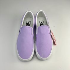 ABOUT:Put your best foot forward & make your outfit pop with these vibrant lavender shoes! Our hand dyed colors have been our specialty for 9 years, so stop searching for that discontinued shade or that uncommon hue you can't seem to find anywhere. We make shoe dreams come true! Each pair is hand dyed & painted using high quality materials with water resistant finishes. Pick between a standard dyed canvas or add some iridescent shimmer to give your shoes a little twinkle. -includes 1 pair of sho Comfortable Purple Summer Sneakers, Lavender Sneakers With Rubber Sole And Round Toe, Casual Purple Canvas Shoes With Rubber Sole, Purple Sneakers With Rubber Sole For Spring, Purple Slip-on Sneakers For Spring, Purple Summer Sneakers For Streetwear, Purple Casual Slip-on Sneakers, Trendy Purple Sneakers For Summer, Casual Purple Canvas Shoes For Streetwear