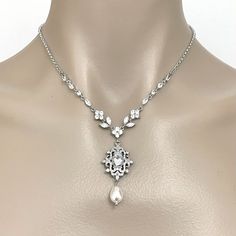 Elegant Bridal Necklace With Intricate Cubic Zirconia Design, Wedding Necklace With Intricate Crystal Design, Wedding Necklaces With Intricate Crystal Design, Exquisite Bridal Necklace With Elegant Design For Wedding, Ornate Pendant Bridal Necklace For Wedding, Ornate Bridal Pendant Necklace For Wedding, Silver Pearl Necklace With Intricate Design For Wedding, Ornate Crystal Necklace For Wedding, Ornate Crystal Wedding Necklace