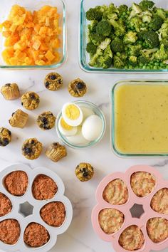 an assortment of food items including eggs, muffins and broccoli