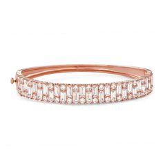 Finish off any ensemble with a touch of sparkle in this cubic zirconia-embellished 14k rose gold plated bangle bracelet. Click on this JEWELRY & WATCHES GUIDE to learn about fit, styles, materials and more! Finish off any ensemble with a touch of sparkle in this cubic zirconia-embellished 14k rose gold plated bangle bracelet. Click on this JEWELRY & WATCHES GUIDE to learn about fit, styles, materials and more! FEATURES Length: 7.25 in. Nickel safe Metal: sterling silver Plating: 14k rose gold Fi Rose Gold Bracelets With Baguette Diamonds, Fine Jewelry Rose Gold Diamond Bracelet With Baguette Cut, Rose Gold Cubic Zirconia Diamond Bangle, Rose Gold Baguette Cut Diamond Bracelet, Rose Gold Diamond-accent Bangle Tennis Bracelet, Rose Gold Bangle Tennis Bracelet With Diamond Accents, Formal Rose Gold Bangle With Cubic Zirconia, Formal Rose Gold Baguette Cut Bracelet, Rose Gold Cubic Zirconia Tennis Bangle Bracelet