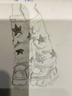 a drawing of a pair of shoes with stars on them