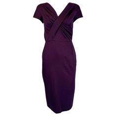 Christian Dior Paris aubergine V neck pleat draped bodice sheath dress. Aubergine silk dobby weave fabric, the bodice features a v wrap neckline with pleats and cap sleeves. A seamed waist and a pencil slim skirt with a center hem back vent makes this classic sheath dress perfect for any special occasion. Lined in purple silk, closes at the back with a zipper & hook & eye at the top. The photo with the label is closer to the actual colour, which is a dark eggplant. Fits like a size 2. In excellent wearable condition. All our clothing is dry cleaned and inspected for condition and is ready to wear. Any condition issues will be noted. For visual comparison our mannequin is a size 4. Please check the measurements provided below and compare with your own measurements for the best possible fit! Classic Sheath Dress, Christian Dior Paris, Pleated Drapes, Draped Bodice, Dior Paris, Dobby Weave, Slim Skirt, Weave Fabric, Purple Silk