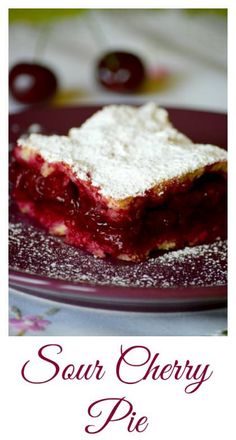 a piece of cherry pie on a purple plate with the words sour cherry pie above it