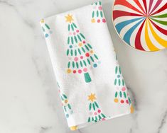 modern christmas tree with rainbow lights, holiday hand towel, whimsical christmas decor, meredith collie paper Handprint Tree Towel, Christmas Tree Hand Print Tea Towel, Powder Room Bathroom, Whimsical Christmas Tree, Holiday Hand Towels, Whimsical Christmas Trees, Modern Christmas Tree, Rainbow Tree, All Over Pattern