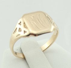 "Rare vintage Early 1900's Ostby and Barton signet ring in solid 14K yellow gold. Mr. Ostby tragically died when the Titanic sank in April 1912. Hand engraved initial \"RM\". Stamped \"O.B.14K\" FREE SHIPPING! Details: 14K Yellow Gold: (as shown in picture) Ring Size: 9 1/2 Total Weight: 4.7 grams FREE domestic shipping by USPS Priority Mail Signature Confirmation and includes insurance. If the item is to be shipped internationally Etsy will calculate postage. Please notify us at purchase if you 14k Gold Signet Ring, Picture Ring, Mail Signature, Engraved Initials, The Titanic, Gold Signet Ring, Spoon Rings, Hand Engraving, Signet Ring