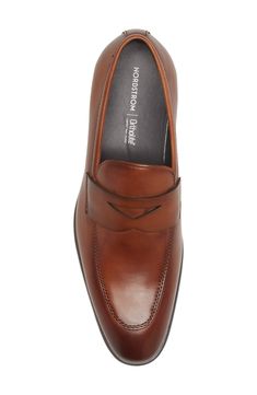 Furnished with a neatly notched penny strap and sleek apron toe, this business-ready leather loafer is ready to conquer meetings and more. OrthoLite® footbed Leather upper/synthetic lining/rubber sole Imported Penny Loafers Men, Penny Loafer, Penny Loafers, Leather Loafers, Nordstrom Rack, Penny, Rubber Sole, Brown Leather, Apron