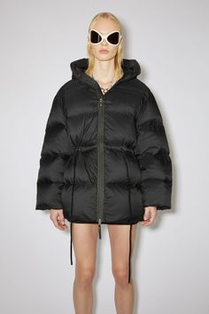 Acne Studios - Hooded puffer coat - Black Black Down Puffer Jacket With Drawstring Hood, Black Sporty Puffer Parka, Black Nylon Puffer Jacket With Drawstring Hood, Sporty Nylon Puffer Parka, Functional Winter Outerwear With Drawstring, Black Drawstring Winter Outerwear, Black Drawstring Outerwear For Winter, Black Winter Outerwear With Drawstring, Fall Nylon Outerwear With Drawstring