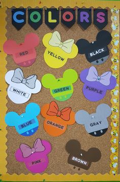 a bulletin board with mickey mouse colors on it