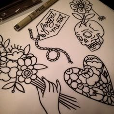 a drawing with some flowers and skulls on it