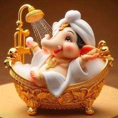 an elephant figurine sitting in a bathtub with water coming out of it