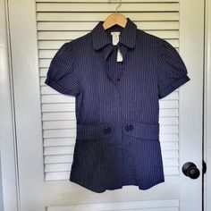 New W/Tags, Y2k Studio Y Style Blouse In Navy Blue W/Pinstripes And Jumbo Buttons, Size Junior Medium. Smoke-Free, Pet-Free Home. Most Items Will Ship In A Clean But Previously Used Shipping Bag To Reduce Plastic Waste. Chic Fitted Top With Vertical Stripes, Chic Fitted Tops With Vertical Stripes, Chic Fitted Vertical Stripes Tops, Fitted Pinstripe Tops For Summer, Fitted Pinstripe Summer Tops, Vertical Striped Fitted Tops, Fitted Tops With Striped Collar For Spring, Navy Fitted Tops For Workwear, Navy Tops For Office In Spring